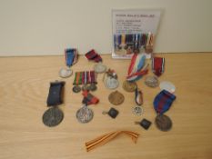 A collection of Miniature Medal with ribbons along with a collection of Coronation and Jubilee