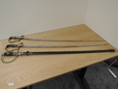 Three German WWII Swords, two blades marked Eickhorn, Solingen, blade lengths 86cm, overall