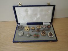 A collection of Military Sweetheart Brooches and Badges including For King and Empire, For Loyal