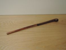 A Native possible African Fighting/Throwing Club, having weighted leather end, overall length 43cm