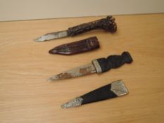 A small Sgian-dubh Knife having 9.5cm blade with scabbard along with a horn handled Hunting Knife