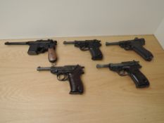 Five reproduction Automatic Pistols, Luger, P-38, Mauser and similar, purchaser must be over the age