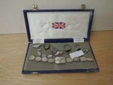 A cased set of Polish Air Force said to be 309 Squadron 1940-42 Lysanders Jewellery, comprising, two