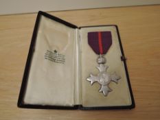 A MBE Military Medal with ribbon in case of issue