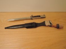 A WWII period German Dress Bayonet having spear point tip, blade marked WH Holler Solingen having