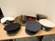 A large box of Caps, Berets, Side Caps, Wren Cap etc, many included