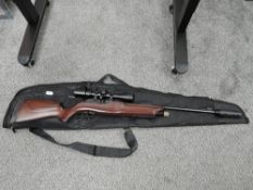 A Hammerli 850 Air Magnum .22 Air Rifle with GoetLand telescopic sights, .22 pellets in tin, in