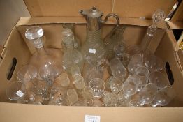 Two glass decanters, a pressed glass and plated claret jug along with a selection of assorted spirit