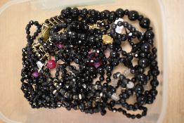 A collection of jet style decorative jewellery to include faceted bead necklaces