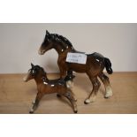 A Beswick pony and foal