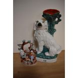 A 19th Century Staffordshire pottery spaniel vase, 35cm tall, and another figural ornament of same