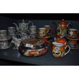 A Japanese lustre glazed coffee set, to comprise a coffee pot, lidded sugar bowl, milk jug, and