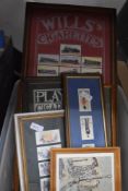 Six assorted sets of cigarette cards in frames etc.