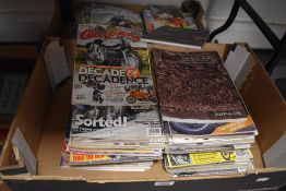 Four cartons of Classic Bike motorcycle magazines.