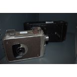 A Kodak Brownie 8mm movie camera and a Kodak No 1A Jr.