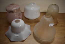 Five vintage glass lamp shades.