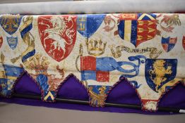 A vintage fabric window blind, decorated with a French heraldic design, 104cm wide