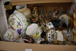 An assortment of items including a Poole dolphin, fruit decorated kitchenware etc.