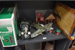 A modern Meccano Supermarine Spitfire, made up with original box along with a Golden Wheel Texaco