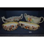 Four flower troughs, a Crown Devon A529L/S floral with cream background, a Delft's hand made for