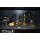 A selection of brass and plated ware including candlesticks, coffee pot and a silver gilt tea pot