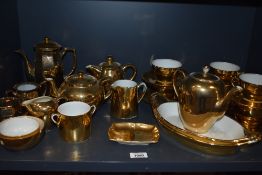 Royal Worcester gold lustre tea set and similar cups and saucers