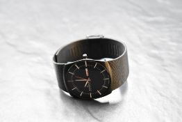 A gent's quartz wrist watch by Skagen, model no: 696XLTBB having baton numeral dial and date