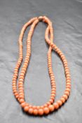 A double string of graduated coral beads with yellow metal box clasp,approx 18' & 41.4g