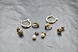 Four pairs of yellow metal earrings, some stamped 9ct/14ct including hoop, knot, pearl etc, approx