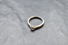 A diamond solitaire ring having diamond set mount, total approx 0.45ct in a 4 claw setting on an