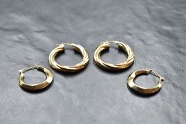 Two pairs of 9ct gold hollow hoop earrings, approx 4.6g
