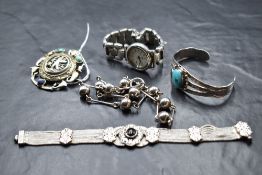 Five pieces of silver and white metal jewellery including necklace, bangle, bracelet, Egyptian