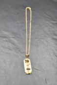 An Egyptian 18ct gold pendant spelling the name Rosemary in hieroglyphics on a 9ct gold chain,