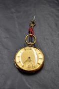 An 18ct gold key wound pocket watch of slim form having Roman numeral dial and subsidiary seconds to
