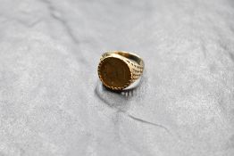 A 1/20th ounce Isle of Man Angel coin dated 1990 in a 9ct gold removable ring mount, size P & approx