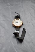 A lady's vintage 9ct gold wrist watch having Arabic numeral dial and rose gold case, case broken and