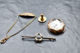 A small selection of 9ct gold including a collar stud, ID bracelet, wrist watch face/case and a