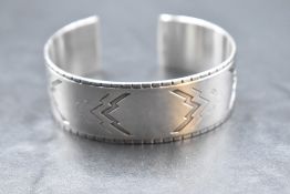 A Georg Jensen Danish silver cuff bangle no: 38 designed by Harald Nielsen having lightning bolt and