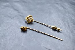 Two yellow metal tie pins, both stamped 14k, one having gold nugget top the other having central