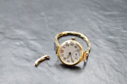 A lady's vintage 18ct gold wrist watch by Brook & Son of Edinburgh having an Arabic numeral face