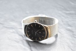 A gent's quartz wrist watch by Skagen, model no: 597LSSM having baton numeral dial and date aperture
