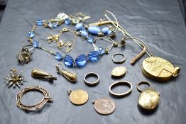 A selection of yellow metal/pinchbeck jewellery including large Victorian locket, glasses frame,