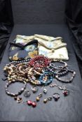 A selection of costume jewellery including several HONORA pearl pieces, silver rings and earrings