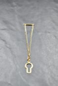 A 9ct gold tie chain with button loop, approx 1.4g