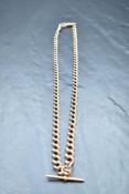 A 9ct rose gold watch chain having T bar fob, approx 19' & 41.7g