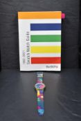 A Swatch 1983-2001 watch guide, sold together with an unboxed Swatch watch 'Ibiskus' wristwatch