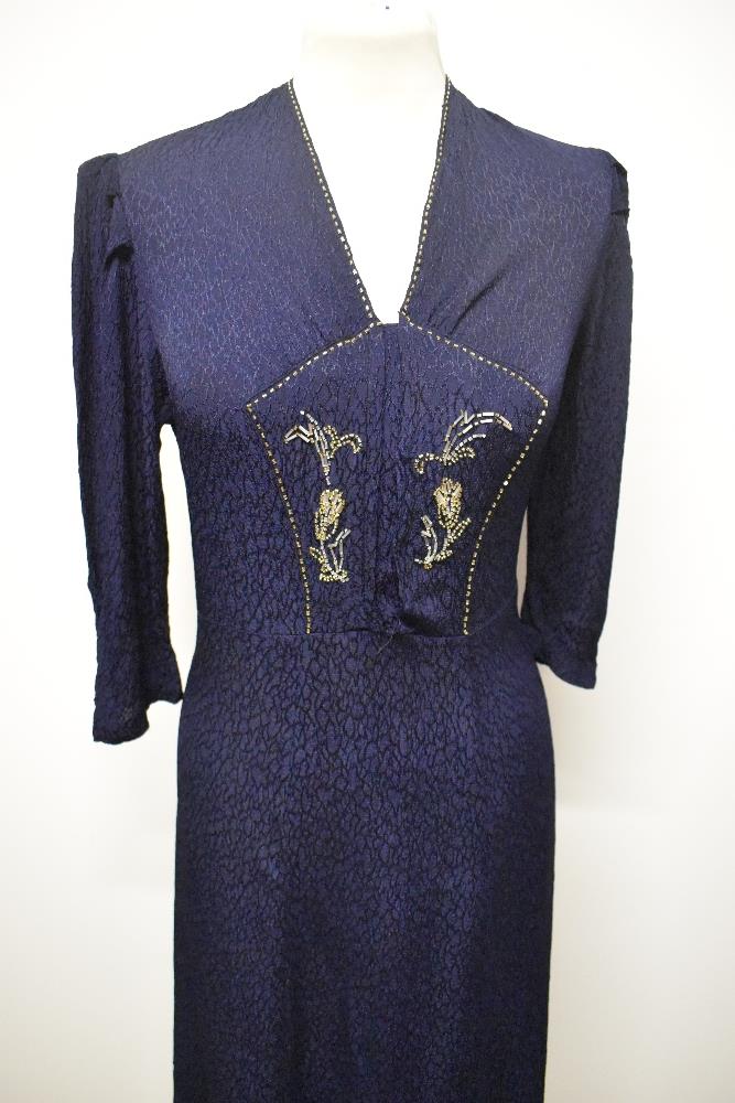 A 1940s navy blue textured crepe day dress, having 3/4 length sleeves, beadwork to bodice and - Image 4 of 6
