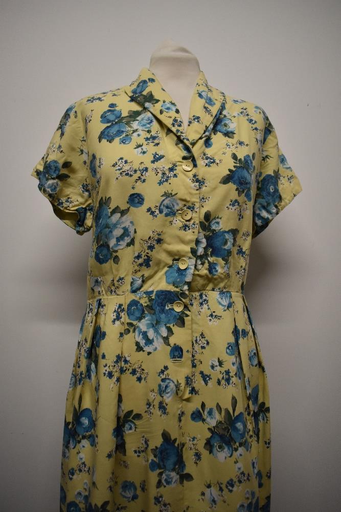 A 1940s St Michael floppy floral cotton day dress, having buttons to front and yellow ground with - Image 2 of 9