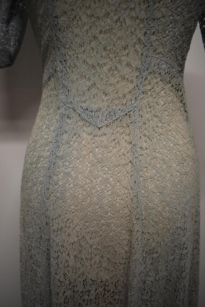A Decadent 1930s blue semi sheer lace cover up/house coat, having centre hook and eye fastening - Image 8 of 11
