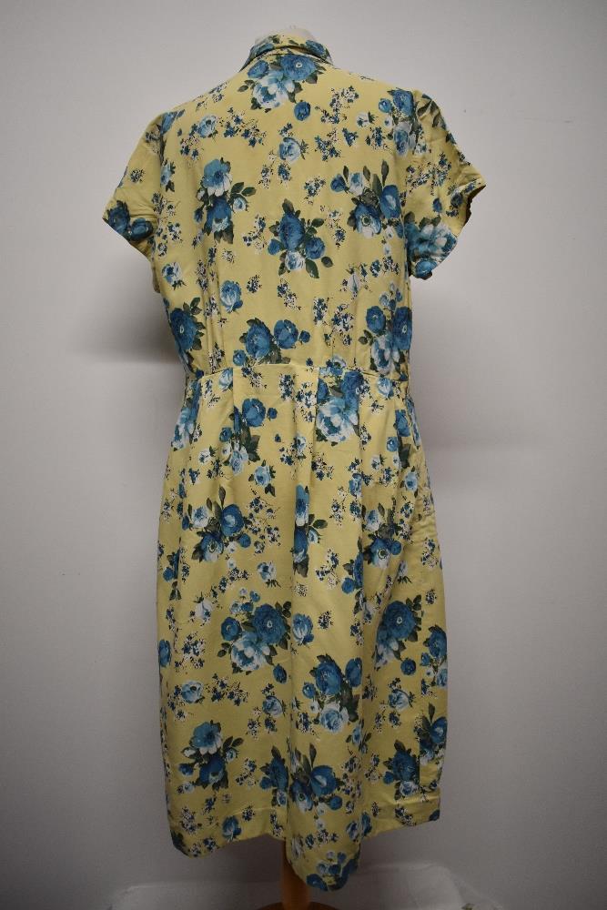 A 1940s St Michael floppy floral cotton day dress, having buttons to front and yellow ground with - Image 5 of 9